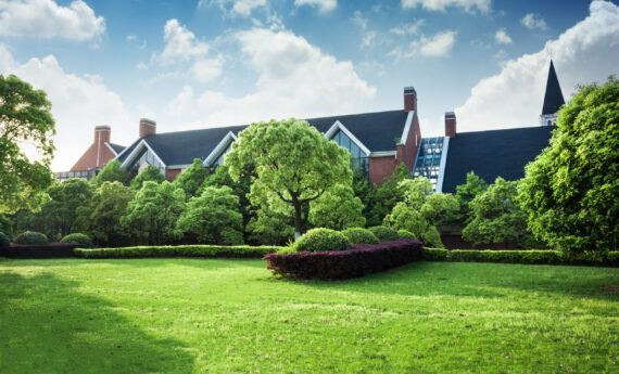 Beautiful modern house in cement, view from the garden.